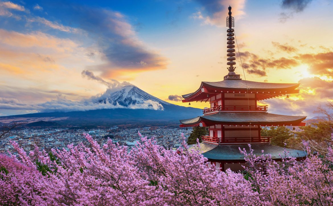 Beautiful landmark of Fuji mountain and Chureito Pagoda with cherry blossoms at sunset, Japan. Spring in Japan.