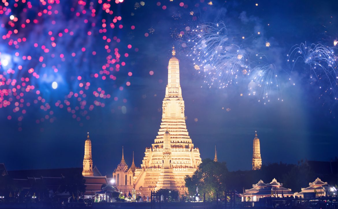 Wat Arun temple in bangkok with fireworks. New year and holiday concept.