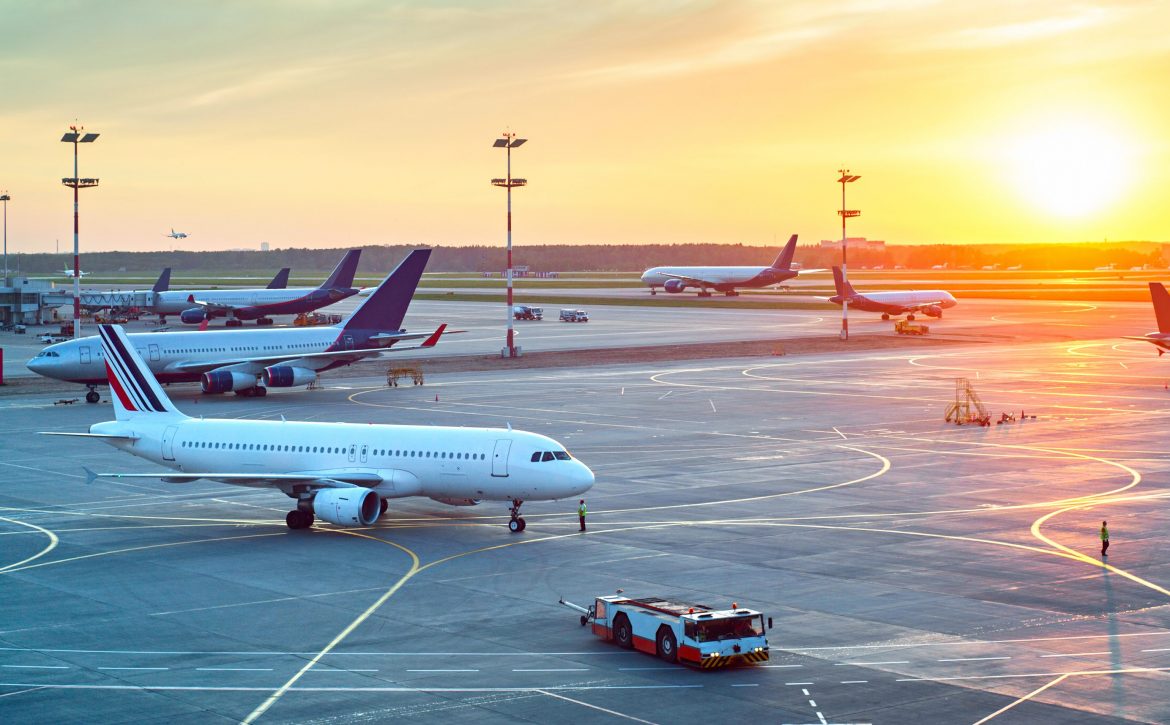 Modern airport at sunset